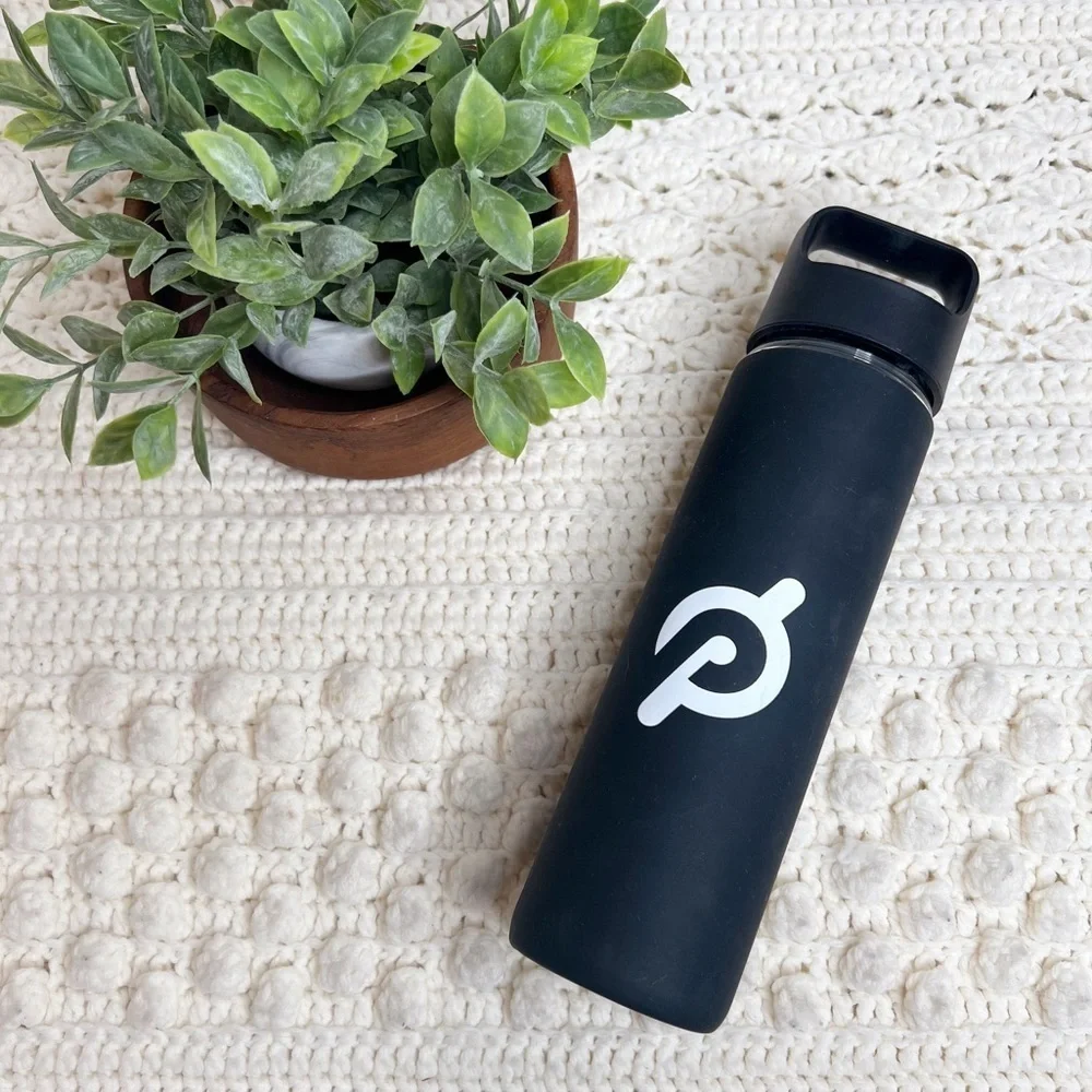 PELOTON Workout Glass Water Bottle with Lid Silicone Sleeve Black Logo